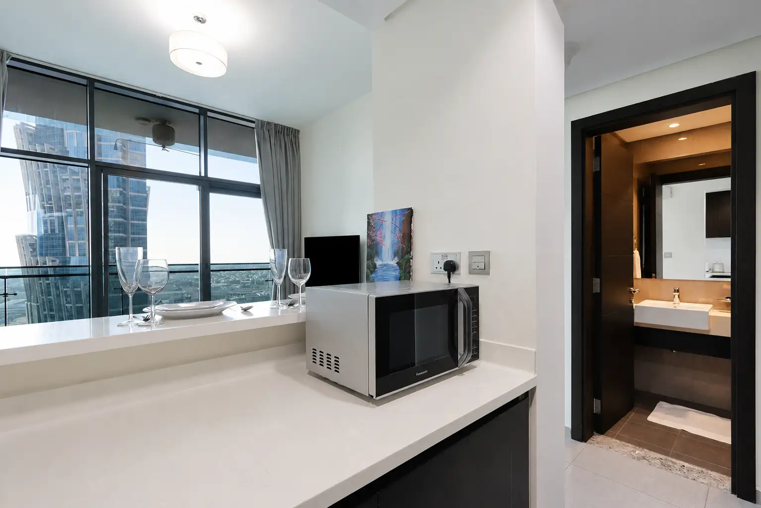 Bright 1 BR Suite In Merano Tower, Dubai