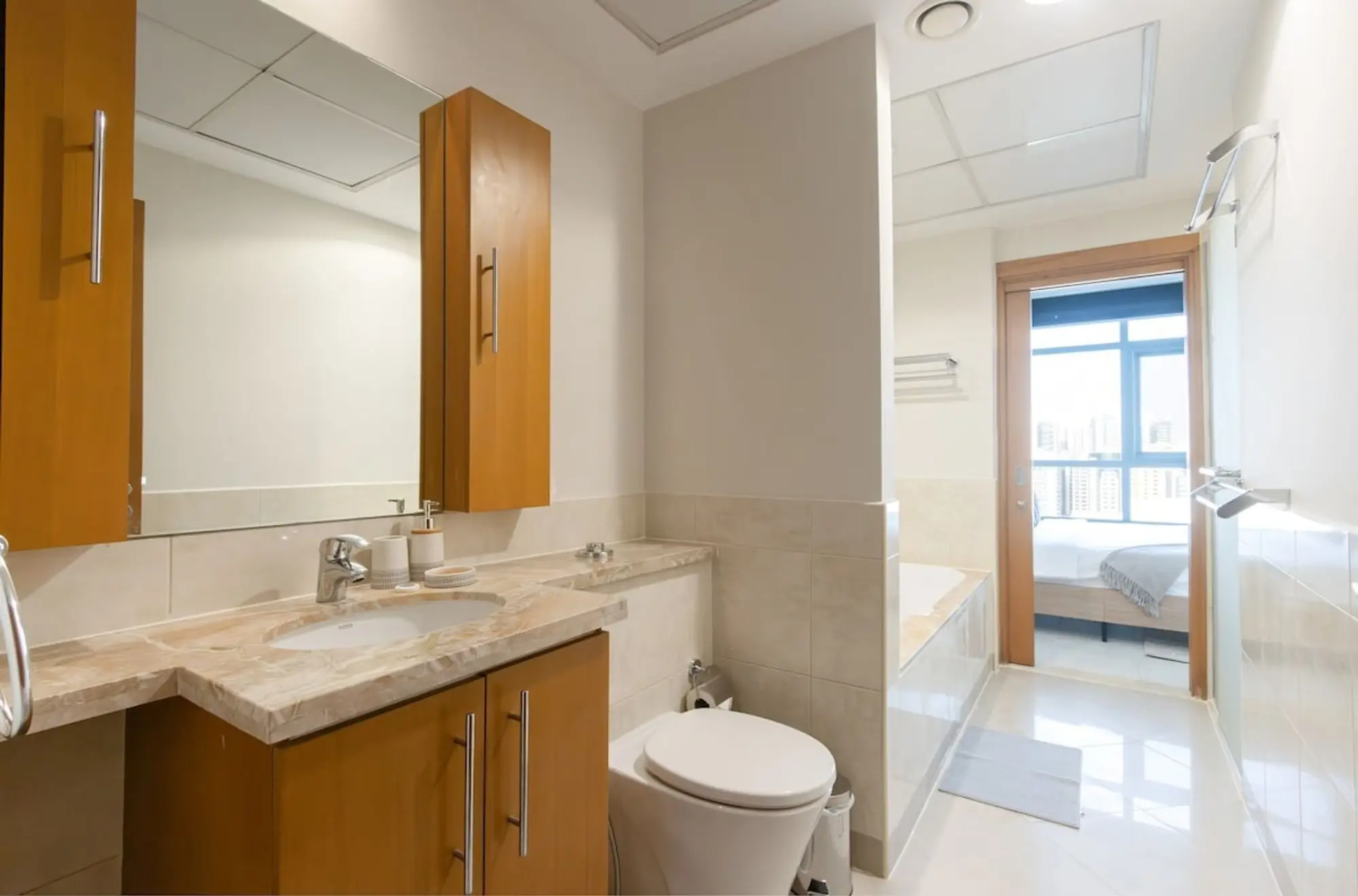 Stylish 1BR Retreat with Pool & Stunning City View, Dubai